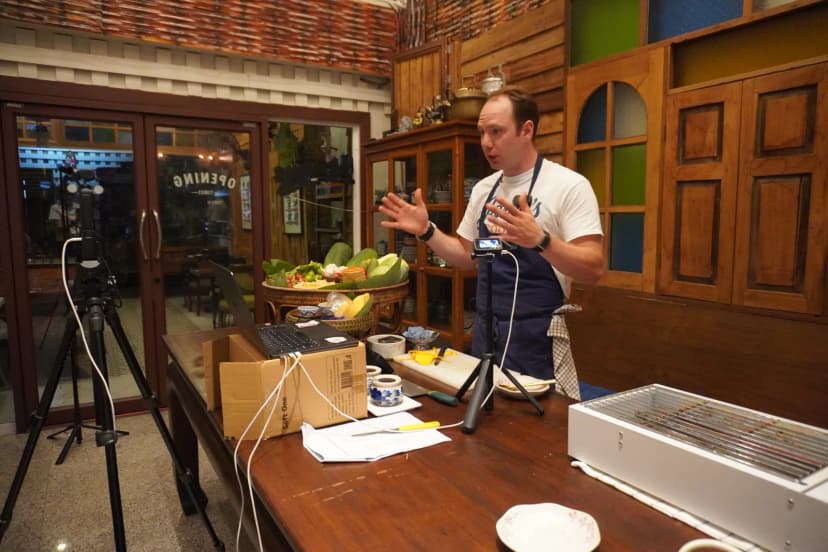 Jason teaching a cooking class from a restaurant in Thailand