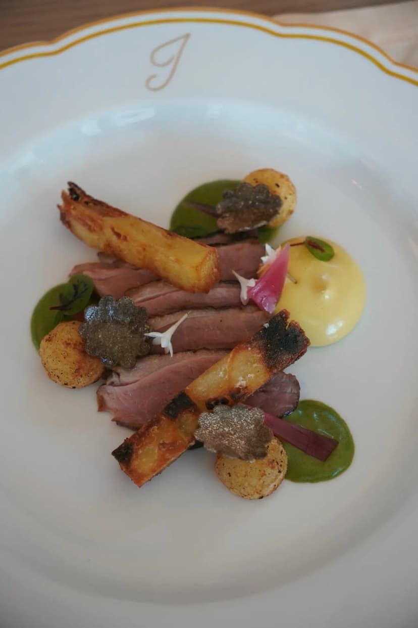 A plate from the Jolie press lunch on a Jolie monogram plate
